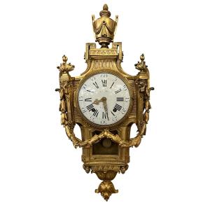 A Gilded Bronze Wall Clock From The Louis XVI Period, With The Dial Signed “lacan A Paris”