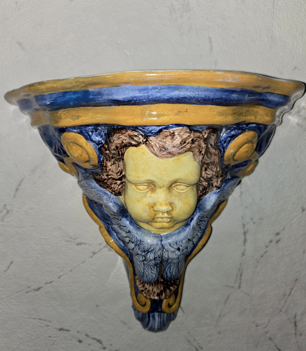 Glazed Ceramic Wall Console With Putto Design-photo-1