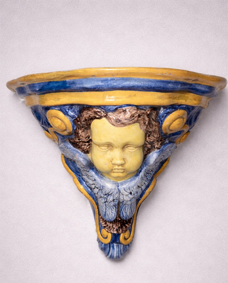 Glazed Ceramic Wall Console With Putto Design