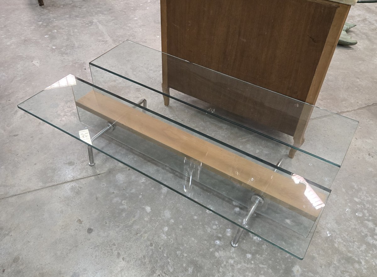 Table basse design des années 1970, alliant transparence et légèreté -photo-1