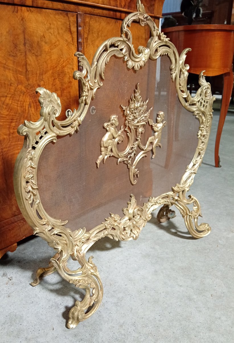 Large Gilded Bronze Fireplace Screen With Putti Motifs And Openwork Rocaille Decoration-photo-5
