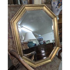 Miroir doré vintage de forme héxagonale