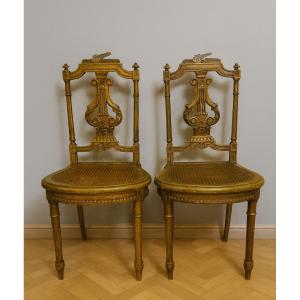 paire de chaises de musiciens en bois sculpté et doré, de style Louis XVI