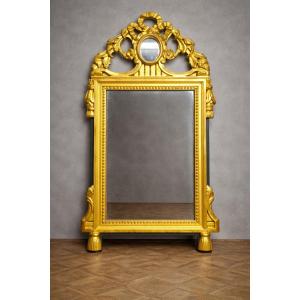 Louis XVI Style Mirror In Gilded And Carved Wood With An Openwork Pediment