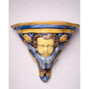 Glazed Ceramic Wall Console With Putto Design