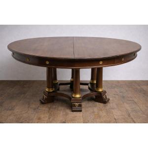Grande table ronde à allonges – piètement à colonnes – époque Empire / acajou    
