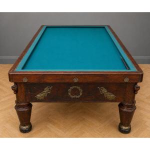 French Empire Period Billiard Table In Mahogany, Resting On Four Sheathed Legs With Ringed Bases.