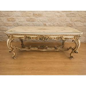 Importante table de salle à manger de style Louis XV, richement sculptée et rehaussée de dorure
