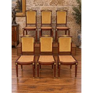 Suite de 6 chaises de salle à manger de style Empire – Acajou, bronzes dorés et cannage