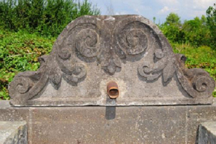 Ancient Fountain In Volcanic Black Stone-photo-2