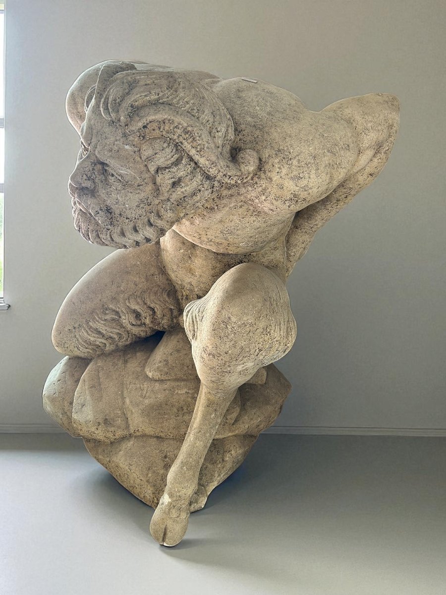 Sculpture Depicting A Kneeling Man -photo-4