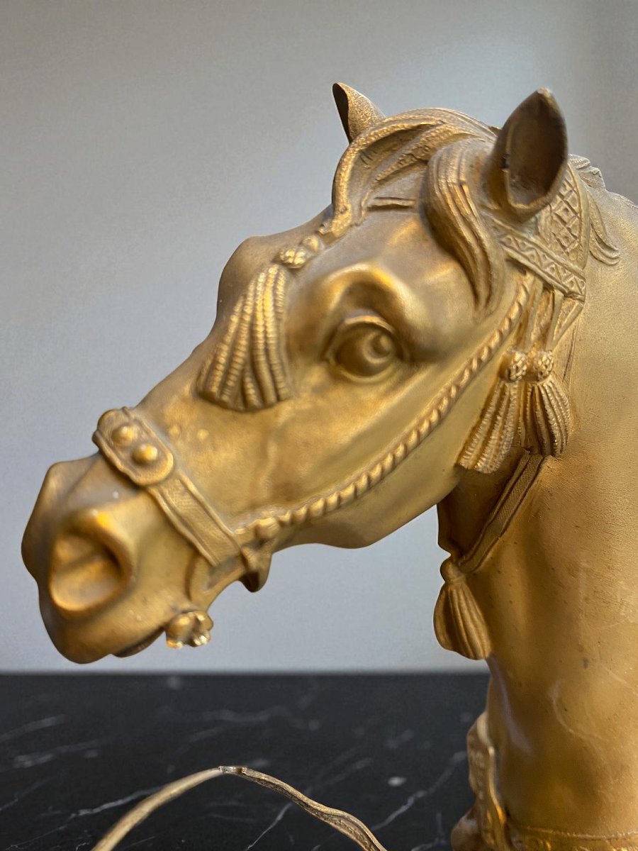 HORLOGE EN BRONZE DORÉ REPRÉSENTANT UNE PERSONNAGE ORIENTAL À CHEVAL-photo-3