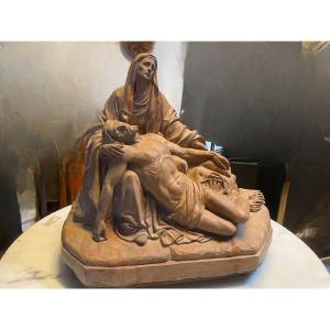 SCULPTURE EN TERRE CUITE REPRÉSENTANT LA PIÈTA, XVIIIe SIÈCLE
