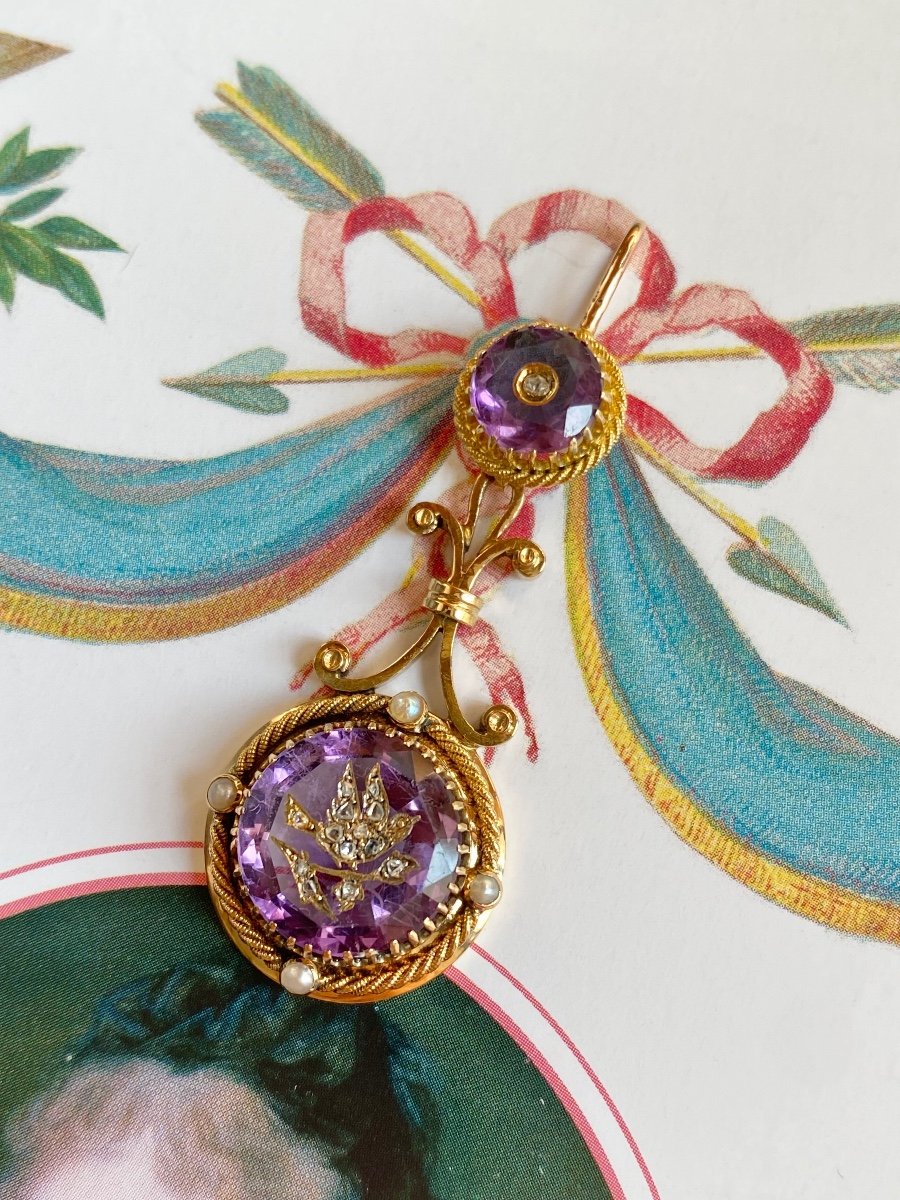 18k Yellow Gold Pendant Composed Of Two Amethysts