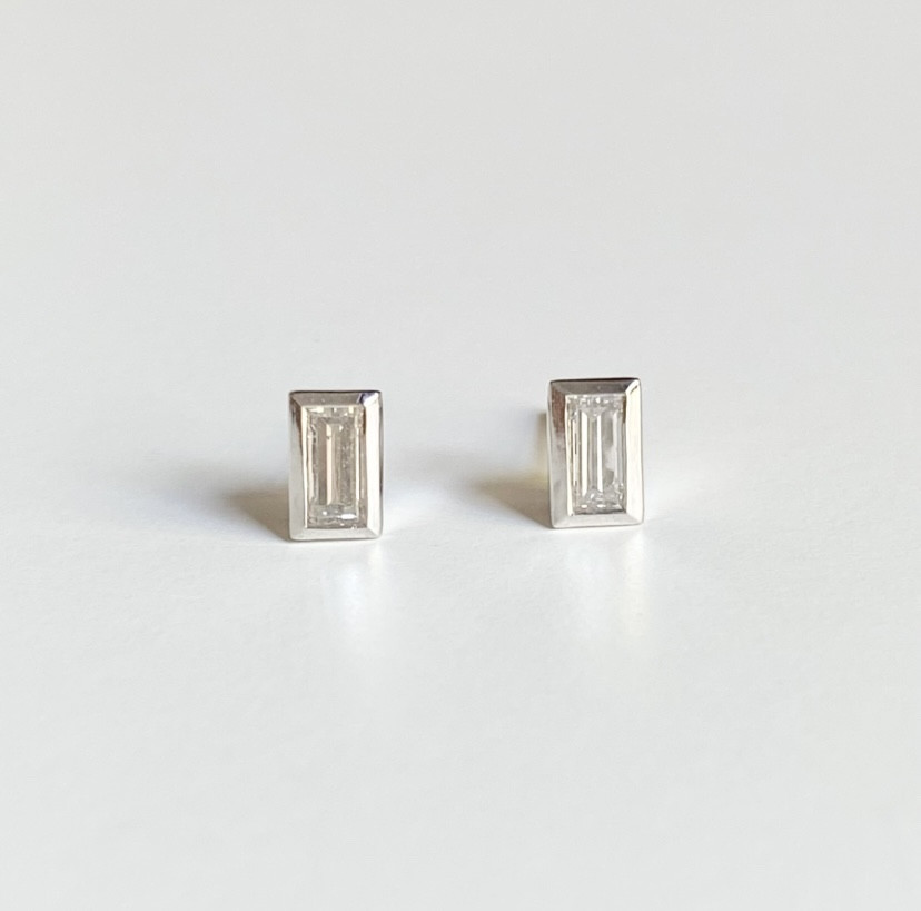 Pair Of 18k White Gold And Diamond Stud Earrings 
