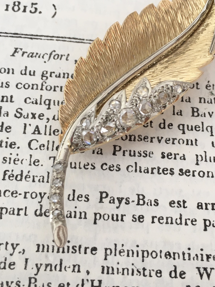 Broche plume en or jaune et blanc 18K et diamants -photo-1