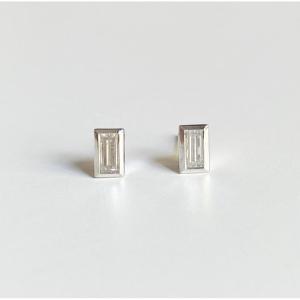 Pair Of 18k White Gold And Diamond Stud Earrings 