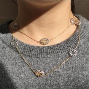 Collier sautoir en or blanc et jaune 18K