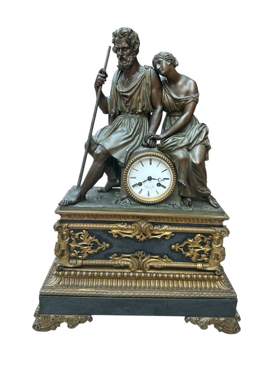 Pendule en bronze doré et patiné , cadran en émail blanc .-photo-1