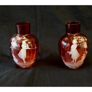 Pair Of Enamelled Red Glass Vases With Mary Gregory Decor, From The Late Nineteenth