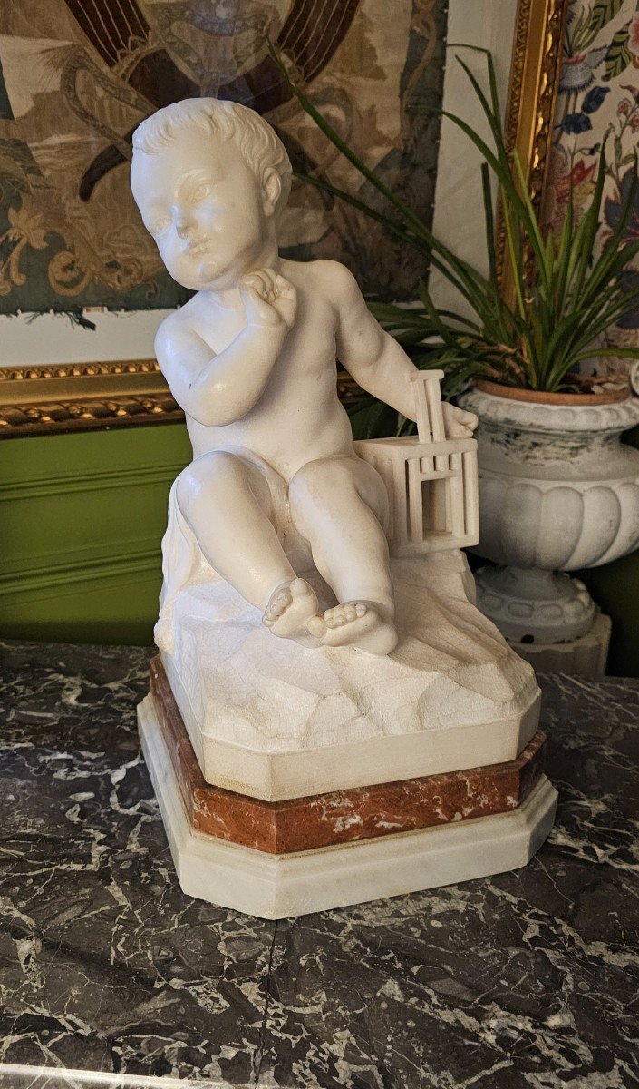 After Jean Baptiste Pigalle, Large White Marble Sculpture ''the Child In The Cage'' 19th Century.