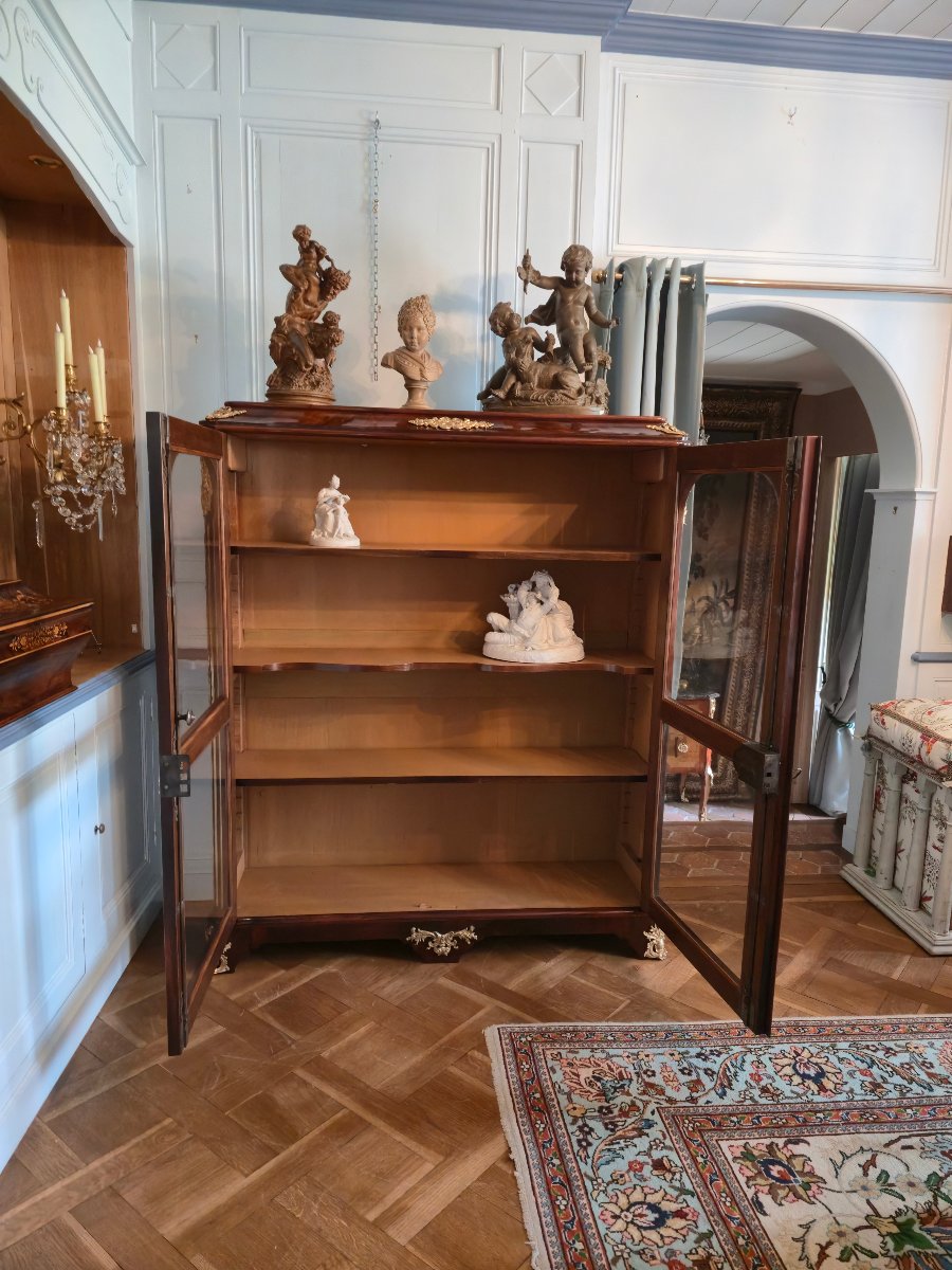 Bibliothèque trois-quarts d'époque Régence en placage de palissandre, remaniée au XIXe siècle. -photo-6