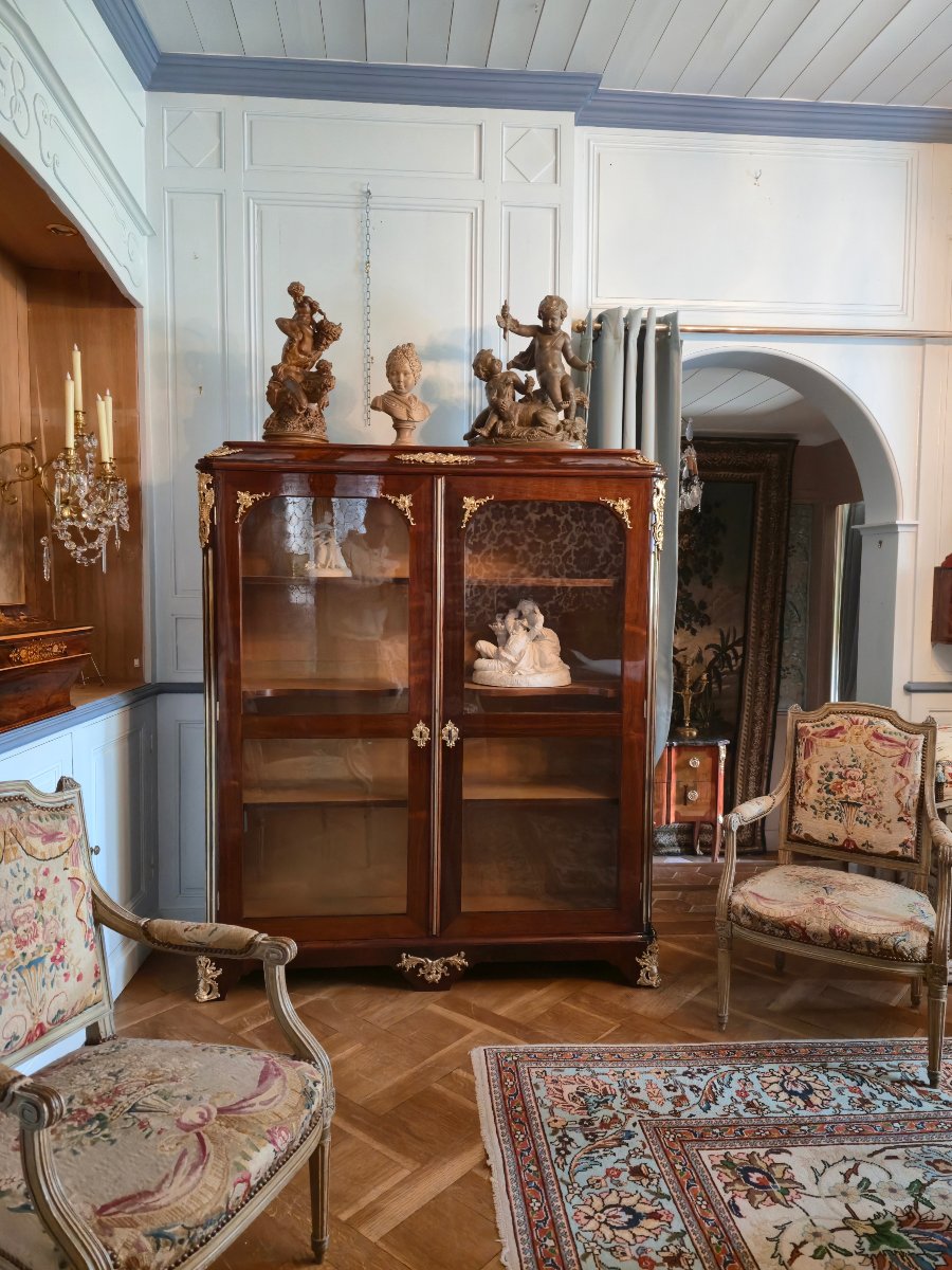 Bibliothèque trois-quarts d'époque Régence en placage de palissandre, remaniée au XIXe siècle. -photo-7