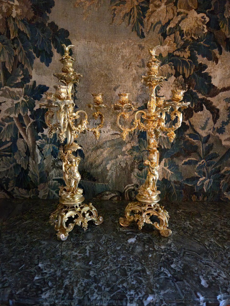 Pair Of Gilded Bronze Candelabra Featuring Bacchus Children, From The Napoleon III Period.