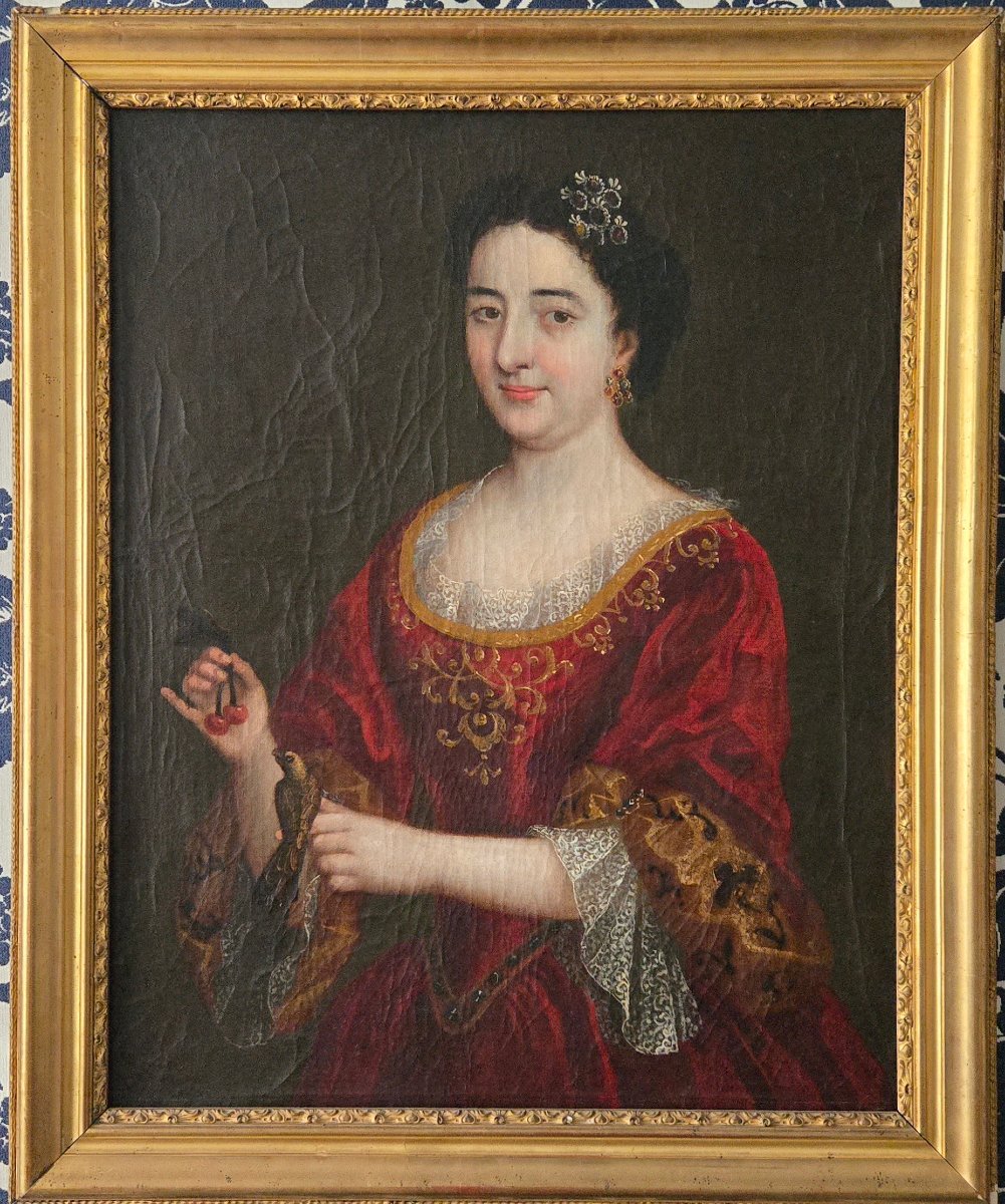 Portrait d'une dame aux cerises et à l'oiseau – École française du XVIIIᵉ siècle.  