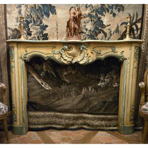 Louis XV Period Carved Walnut Rocaille Fireplace, Lyon Work, Circa 1740–1760.  