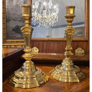 Pair Of Regency Candlesticks, Chased And Gilded Bronze – First Half Of The 18th Century.  