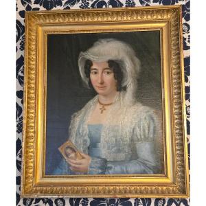 Portrait Of A Young Woman Holding A Medallion. Oil On Canvas – Directoire/empire Period