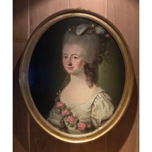 Portrait de jeune femme aux roses, coiffure au pouf, époque Louis XVI.  