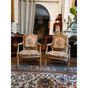 Paire de fauteuils à la reine d'époque Louis XVI, garnis de leur tapisserie de Beauvais.