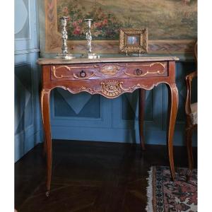 A Mid-sized Writing Table With Heraldic-inspired Decoration. Louis XV Period, Mid-18th Century