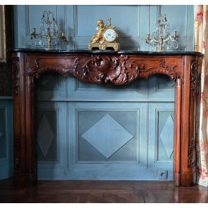 Lyon-style Mantelpiece In Carved Walnut With Rich Rocaille Decoration—louis XV Period, Circa 1740–1760.
