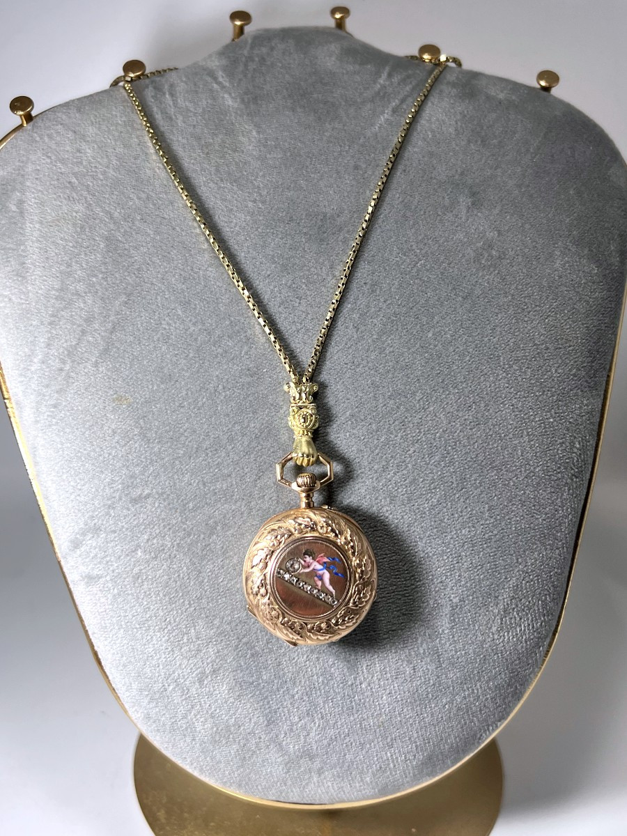 Montre de col et sa giletière l'ensemble en or