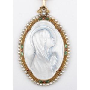 Large Mother-of-pearl Medallion With A Gold Setting And Pearls