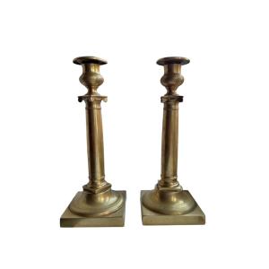 2 bougeoirs dorés, style Empire, XIXe siècle