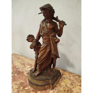 Spelter Statue Of A Man And Child