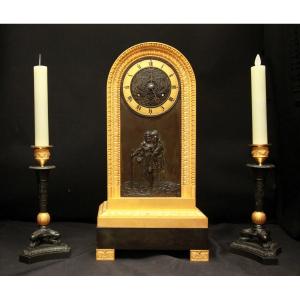 Fireplace Mantelpiece: A Clock Accompanied By A Pair Of Candelabra