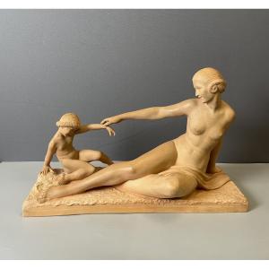 La Mère et l'Enfant Sujet en Terre Cuite signé M. Bouraine 