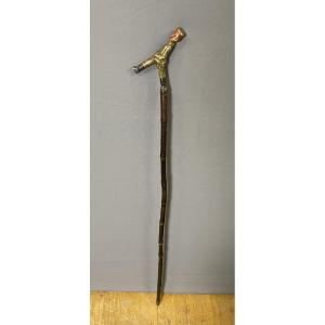 Canne en bois sculpté polychrome représentant un officier 
