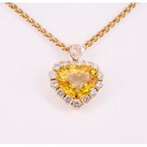 Collier Or Chopard , Pendentif coeur saphir jaune et diamants signé Dubail Paris