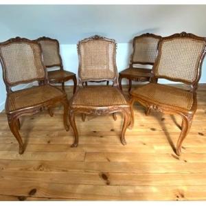 Serie de Six chaises cannées,  à la grenade. Epoque Régence. 18e siècle 
