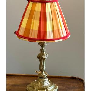 Bougeoir en bronze doré, monté en lampe .Epoque 19è siècle