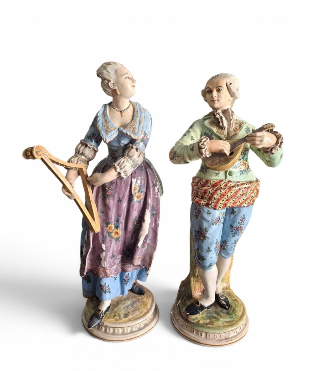 Paire de grandes figures de musiciens