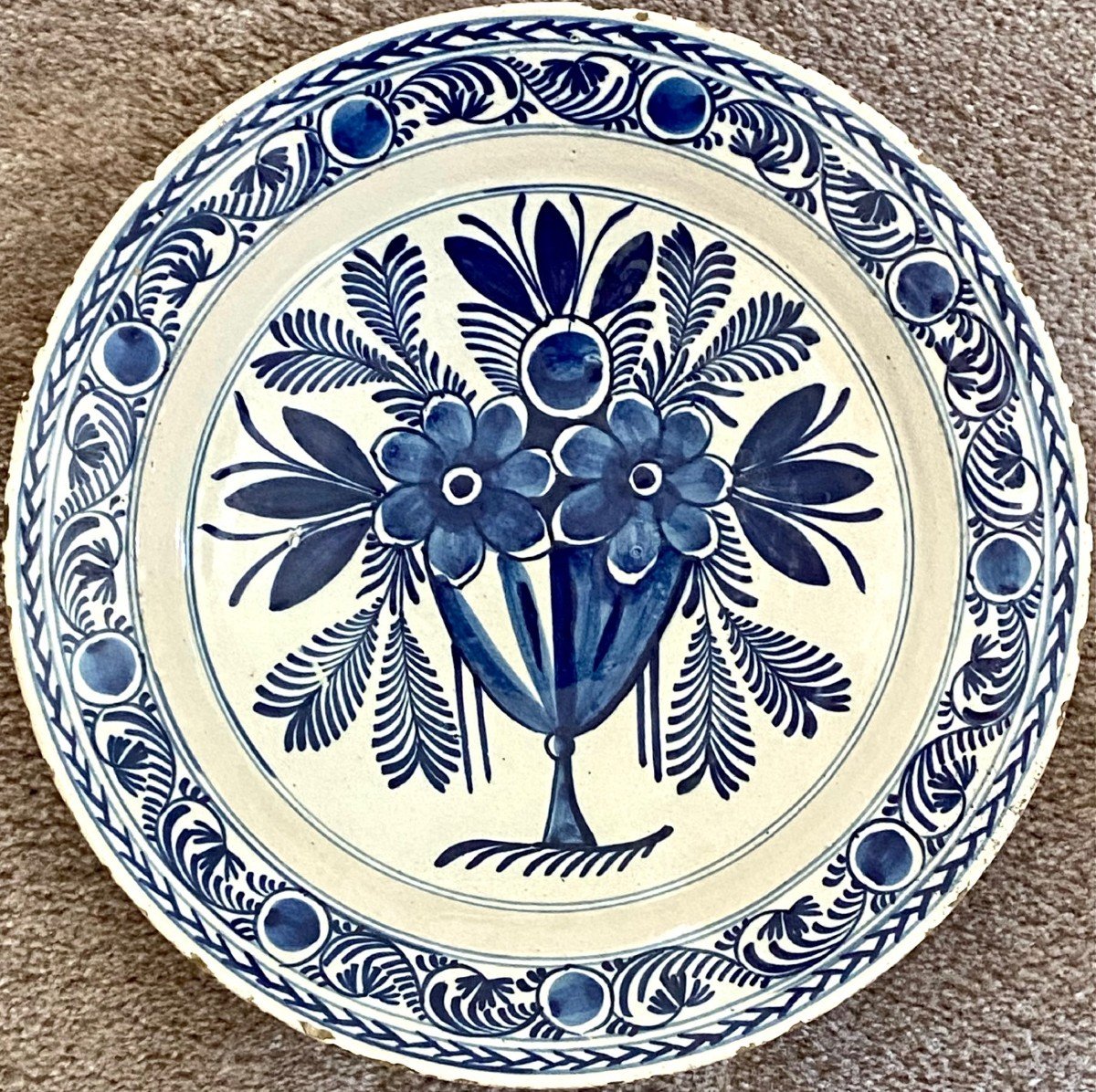 Delft, XVIIIth Century, Earthenware Dish Decorated With A Bouquet Of Flowers.