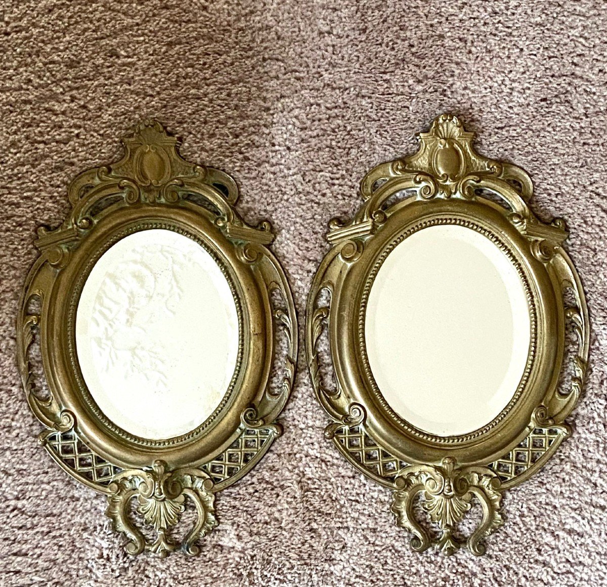 France, 1930s, Pair Of Rocaille Style Bronze Framed Mirrors.