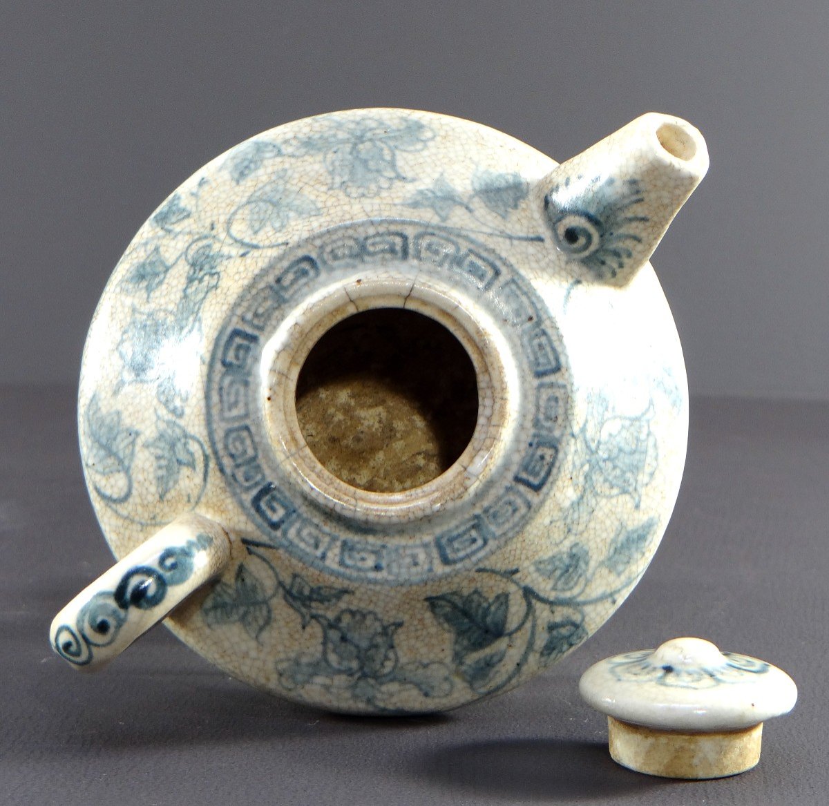 Vietnam, Mid-20th Century, Cracked Porcelain Teapot With Floral Decor In Blue.-photo-1